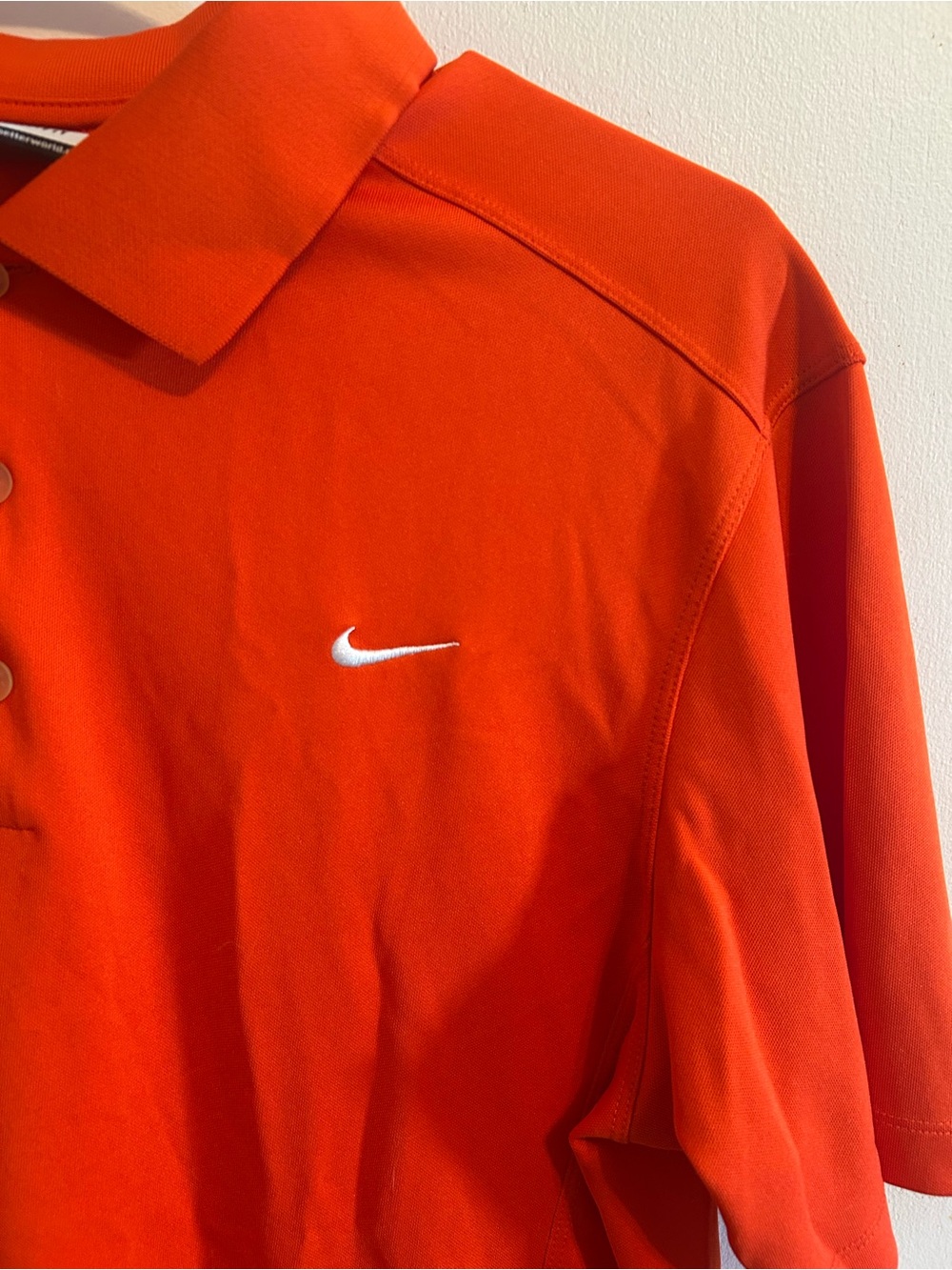 Nike Men’s Bright Orange Polo with White Swoosh
